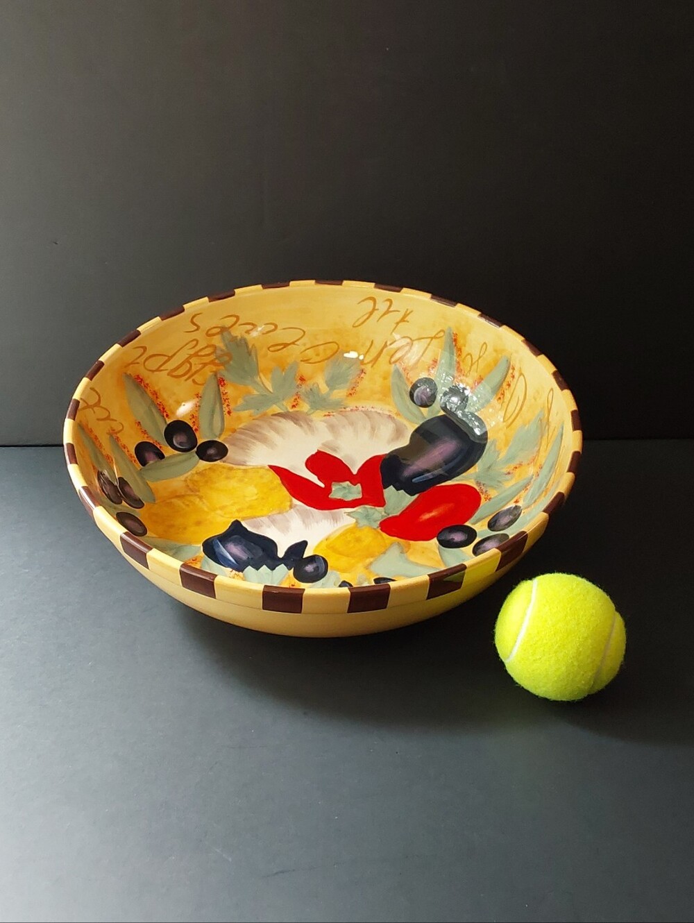 Certified International Yellow Ceramic Serving Bowl with Red and Black Accents